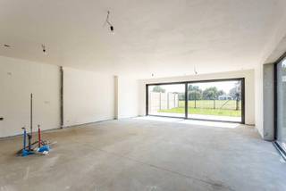 Located in Erwetegem, a borough of Zottegem, is this spacious, semi-open-plan new-build home where comfort, light and quality take centre stage.<br /><br />FINISHES OF YOUR CHOICE:<br />On the ground floor, you are welcomed into a well-appointed entrance hall with a separate guest toilet and washbasin. A spacious, light-filled living area, finished with high-quality flooring, flows seamlessly into the kitchen. Thanks to the large windows, you can enjoy a beautiful view of the sunny garden and the fields beyond. From the living area, you have direct access to the landscaped terrace.<br />The property also features a spacious storage room behind the kitchen and a fully-fledged room on the ground floor. This space is ideal as a fourth bedroom, an office or a practice room for a self-employed business or working from home.<br /><br />On the first floor, there are three spacious bedrooms, with the added possibility of fitting out a walk-in wardrobe. A spacious, stylish bathroom is ready to be fitted out and can be equipped with all modern conveniences. Allow for this in your budget!<br />In addition, there is a separate toilet in the night hall.<br /><br />The property is fitted with aluminium windows featuring high-efficiency glazing, ensuring excellent insulation and energy-efficient living comfort.<br /><br />-Land: €212,587<br />-Construction: €307,412<br />Sale: 12% registration tax on the land &amp; 21% VAT on the construction<br /><br />Interested? Contact Roxanne for more information or to arrange a viewing on: 0496 85 09 62