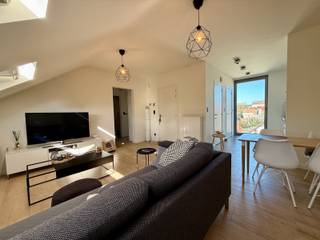 2-slaapkamerappartement aan de Grote Markt te Tienen, met onder andere een bewoonbare oppervlakte van 80 m², twee slaapkamers (één grote en...