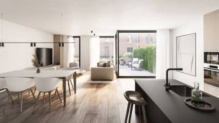 A0.4 is een ruim energiezuinig 1 slaapkamer appartement op het gelijkvloers met een grote leefruimte met open keuken voorzien van eiland. Het zonnige zuidwest gerichte terras is bereikbaar vanuit de leefruimte via schuifraam. Net naast de open keuken bevindt zich de bergruimte. De slaapkamer is gelegen aan de noordoostkant. In de inkomhal heeft u de mogelijkheid een vestiairekast te plaatsen. De badkamer is voorzien van een ruime douche en lavabo meubel en er is een apart toilet. Dit zeer energiezuinig appartement wordt verwarmd met een collectieve warmtepomp. Ondergronds bevindt zich een gemakkelijk bereikbare keldergarage met staanplaatsen en berging. De autostaanplaats dient mee aangekocht te worden voor een prijs van 27.500,00 euro exclusief kosten. De eerste kopers hebben de mogelijkheid om een tweede autostaanplaats mee aan te kopen.<br />Dit mooie appartement is gelegen in de tuinen van het volledig gerenoveerde Clarissenklooster. Vanaf uw leefruimte en terras heeft u een prachtig zicht op de gemeenschappelijke tuin en klooster. Maak een afspraak voor een bezoek ter plaatse.