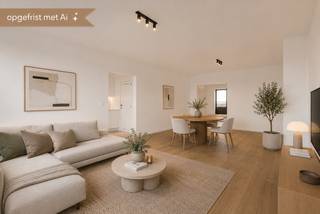 Dit smaakvol vernieuwde appartement is gelegen aan het Sporthalplein 148, op de 10de verdieping, en geniet van prachtige open zichten. Dankzij de terrassen aan zowel de voor- als achterzijde kan u op elk moment van de dag genieten van zon en uitzicht.<br /><br />Het appartement werd grondig gerenoveerd met onder meer nieuwe ramen, vernieuwde sanitaire afvoeren, een volledig nieuwe elektriciteit die conform is voor de komende 25 jaar, en een kwalitatieve afwerking doorheen het hele appartement.<br /><br />De indeling omvat een inkomhal met beveiligde deur, een apart gastentoilet, een moderne badkamer met inloopdouche en een lichtrijke leefruimte. De nieuwe, moderne keuken geeft rechtstreeks toegang tot het terras en biedt een aangename verbinding met buiten. Aansluitend bevindt zich een praktische berging, ideaal voor onder andere wasmachine en droogkast. Verder zijn er twee ruime slaapkamers, geschikt voor dubbele bedden.<br /><br />Daarnaast genieten bewoners van gemeenschappelijke autostaanplaatsen vlak voor de deur, exclusief voor de residentie, wat zorgt voor extra comfort. Een privatieve berging op niveau -2 is inbegrepen, ideaal voor bijkomende opslagruimte.<br /><br />Dankzij de nieuwe ramen behaalt het appartement een gunstige EPC-score met label B.<br /><br />Ideaal als investering of als comfortabele eigen woonst.