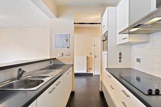 This bright 95 m² apartment is located on the first floor of a well-kept building and combines space, comfort and a very convenient location.The pleasant living and dining area enjoys plenty of natural light and connects to an open, fully equipped kitchen with hob, extractor, oven, dishwasher and built-in fridge with freezer. Large sliding windows provide access to a terrace across the full width of the living space.The apartment also has two bedrooms, a bathroom with a double sink and bath, a separate toilet and a practical storage room with a washing machine and dryer connection. Bicycle storage is available and the building is equipped with a lift.The apartment is part of Residentie Noordstar (built in 2006) and is located near the Oude Dokken and Dok Noord. The city center and station are easily accessible on foot or by bike (Dampoort about 1.6 km). Bus and tram stops are right outside the door, and there is also a quick connection by car via the R4.Mandatory to purchase: a parking space at the back of the building for €20,000.A comfortable and well located apartment, ideal for private living or as an investment.EPC: 104 kWh/m²EPC: 104.0 kWh/m²EPC: 104.0 kWh/m²