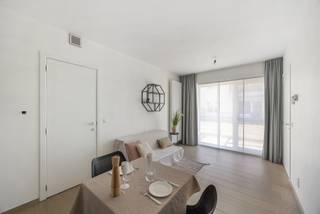 GRONDPLAN + 3D + FLOORPLANNER + VOLLEDIGE BESCHRIJVING OP DE WEBSITE www.bauwensvastgoed.be Instapklaar Gelijkvloers Appartement met Tuinterras...