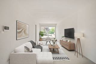 Dit duplex appartement met enorm veel natuurlijke lichtinval en ruime zuidgerichte terras biedt tal van andere troeven...ONTDEK HET APPARTEMENT VIA...