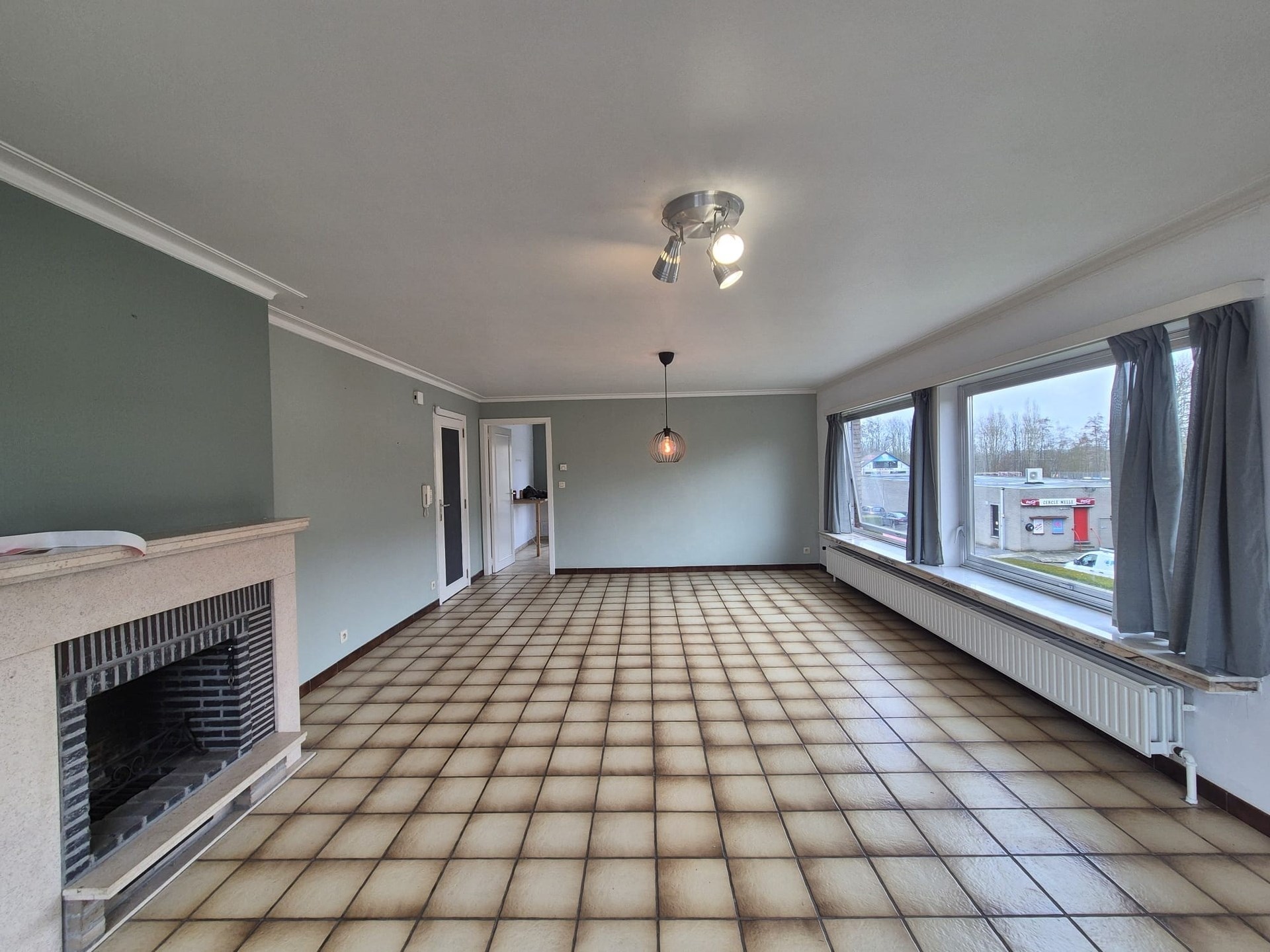 Centraal gelegen ruim appartement met groot zongericht terras en garage. - foto 3