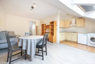 IXELLES, on a quiet street 200 metres from Place Fernand Cocq and the pedestrianised Chaussée d'Ixelles, on the 3rd floor of a characterful...