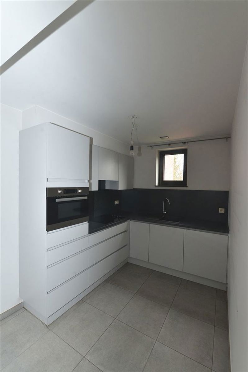 Appartement met 2 slaapkamers, terras en staanplaats - foto 4