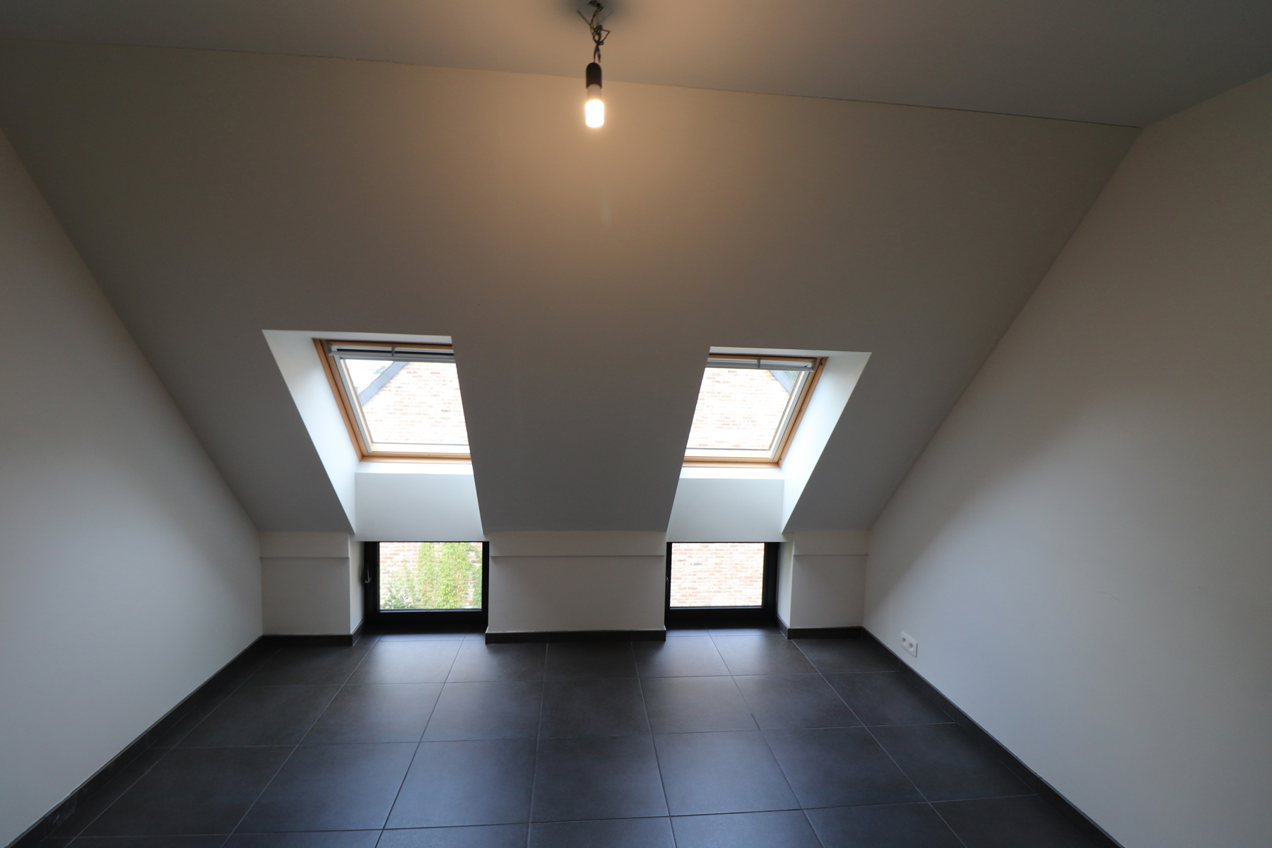 Een recent duplexappartement op de tweede en op de dakverdieping - met terras en garage. - foto 5