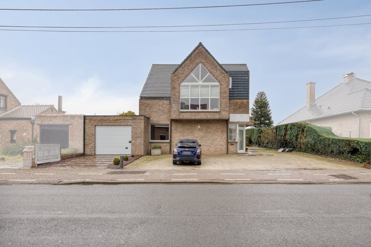 Ruime woning met tuin en handelsruimte of kantoor op glvl - foto 1