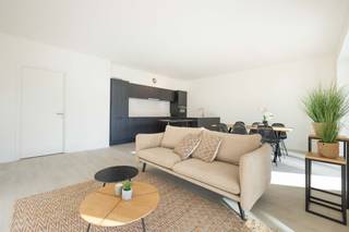 <span><strong>VILVORDE </strong></span>- This two-bedroom apartment in the Waterzicht project offers a unique living environment on the waterfront, in the new 4 Fonteinen district. Designed to meet the needs of families, it offers generous proportions, a functional layout, and a pleasant living environment in the immediate vicinity of Brussels.<br />The bright living room with open kitchen opens onto a private terrace, a true extension of the living space. The two bedrooms are well proportioned and allow for flexible layout, complemented by an elegant bathroom and quality fixtures.<br />With underfloor heating, a dual-flow ventilation system, and high energy efficiency, the apartment guarantees lasting comfort and low utility bills. The well-maintained common areas, shared gardens, and proximity to transportation further enhance the property's appeal.<br />Depending on the options available, delivered as is or with the possibility of customizing the property by choosing your finishes, and sold with the opportunity to benefit from 6% VAT, this two-bedroom apartment represents a rare opportunity to settle in a rapidly developing neighborhood, combining quality of life and excellent accessibility.<br />The surface areas are given as an indication only. Contact us for more information.