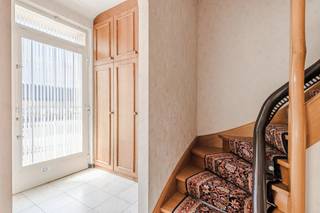 Charming semi-detached home in need of renovation in a prime location in the heart of Oud-Turnhout<br /><br />Just a stone’s throw from the charming village square of Oud-Turnhout, within walking distance of restaurants, shops, a pharmacy, a butcher, schools, and all daily amenities, you’ll find this charming semi-detached home brimming with potential.<br /><br />You enter the home through the entry hall with a coat closet. The living room enjoys pleasant natural light, thanks in part to its corner location. From the living area, you have a view of the garden both to the side and at the back.<br /><br />The kitchen connects to a practical basement and provides access to the already renovated bathroom at the rear. In addition, the ground floor features a spacious laundry/storage room with direct access to the garden.<br /><br />The first floor features three bedrooms. The very spacious attic currently offers plenty of storage space but, with the installation of a fixed staircase, could be perfectly converted into additional living space.<br /><br />Outside, this property also offers numerous possibilities. The lot includes a simple garage and several storage sheds in need of a refresh. The cozy garden is graced by a beautiful pear tree and two mature trees that create a green, atmospheric setting.<br /><br />A charming home in a prime location, with plenty of natural light, excellent accessibility, and all the potential to become a beautiful family home in the center of Oud-Turnhout.