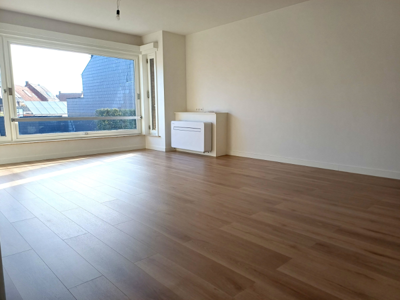 Volledig gerenoveerd en energiezuinig appartement met 2 slaapkamers, balkon en garage - foto 5