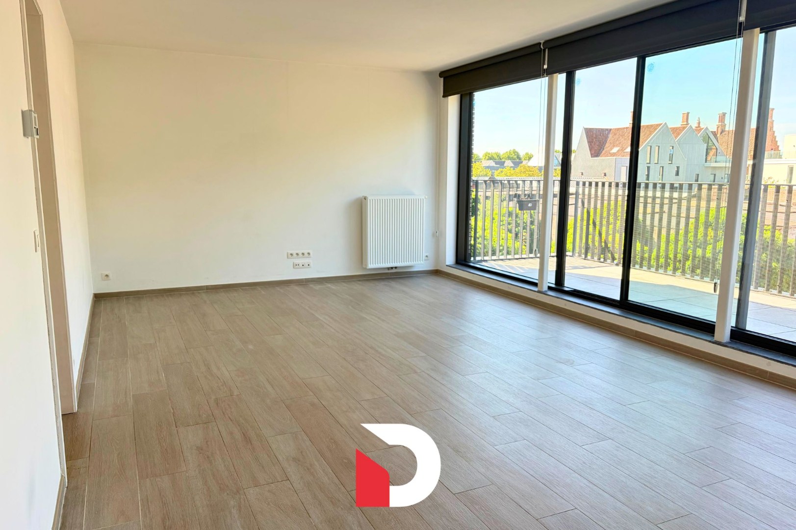 Appartement met 2 slaapkamers, ruim terras en autostaanplaats - foto 4