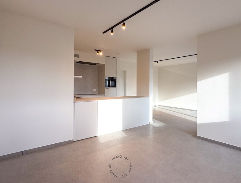 Lichtrijk nieuwbouwappartement met twee slaapkamers, terras en autostaanplaats - foto 5