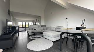 ### Lichtrijk appartement met hoge plafonds en zonneterrasDit instapklaar 2-slaapkamer appartement van 96m² combineert een moderne afwerking met een...