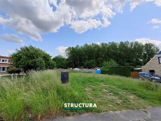 Bouwgrond voor halfopen bebouwing te koop op absolute voorkeursligging in het idyllische Mollem!Het betreft een perceel van 3a 04ca met een...