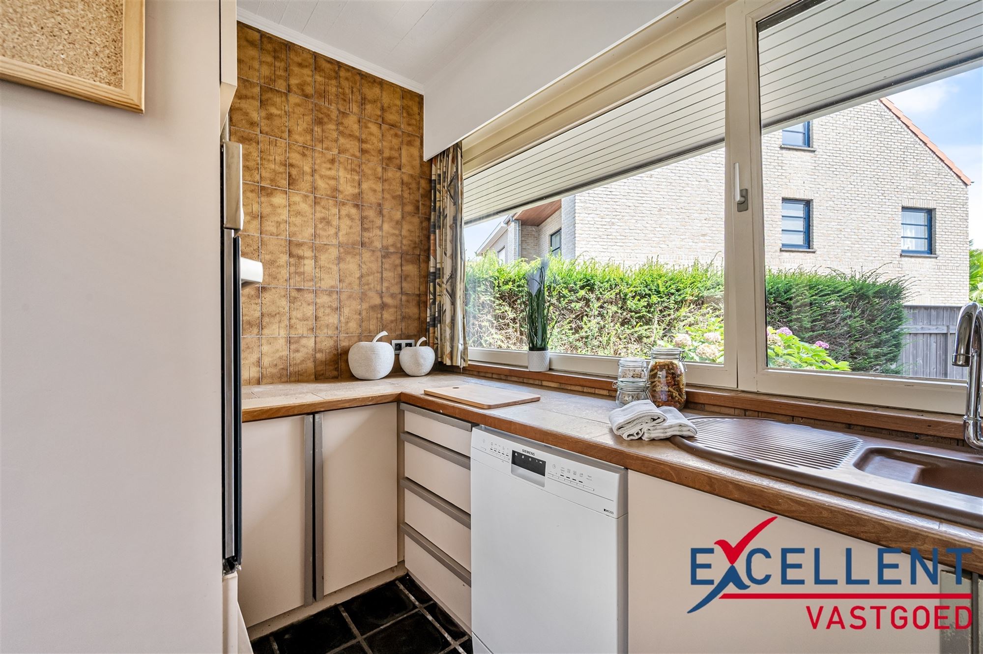 Charmante woning met prachtige tuin en bijhorend handelspand  - foto 4