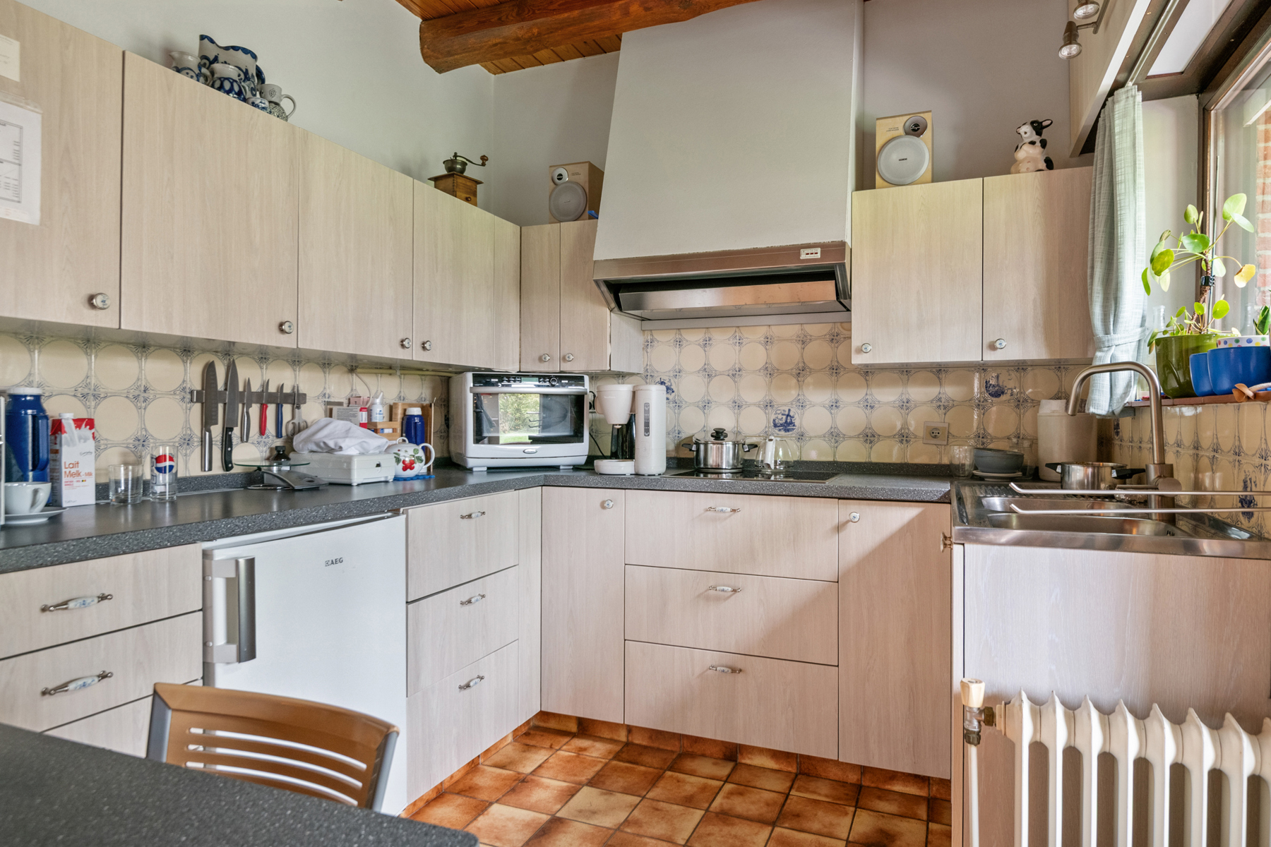Mooi gelegen, karakteristieke halfopen woning met veel renovatiepotentieel in Kalmthout. - foto 5