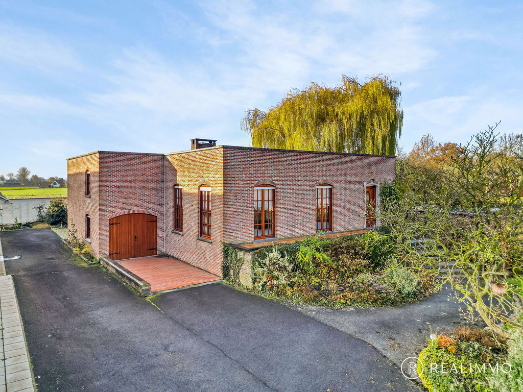 Alleenstaande woning met atelier in St-Denijs - foto 2