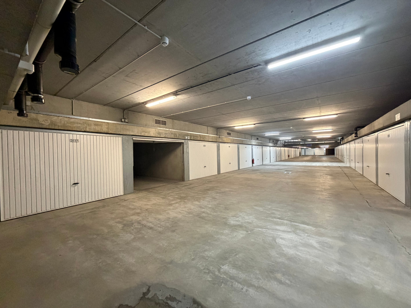 Ruime garagebox in het Stubbenpark te Duinbergen - foto 2