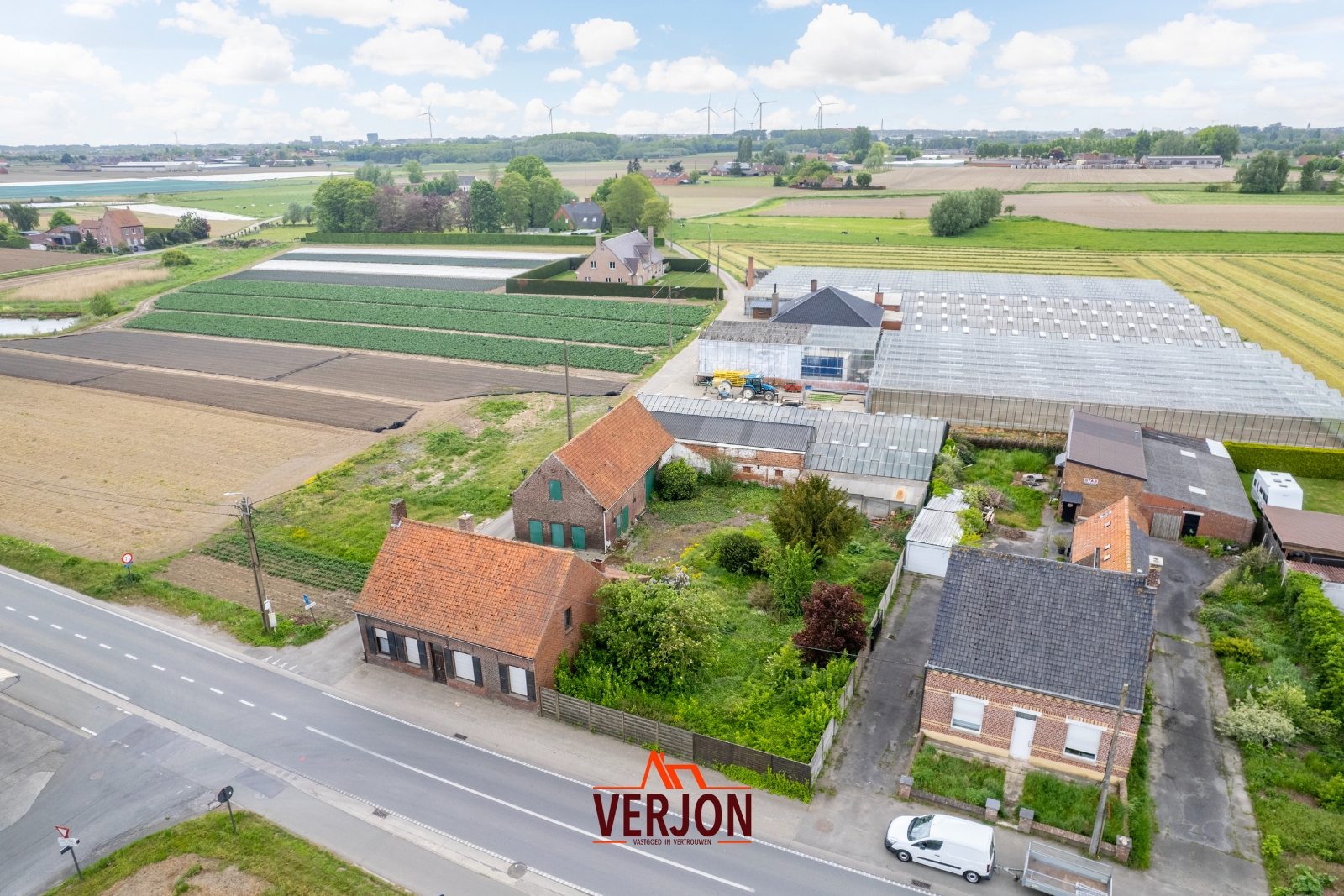 Te renoveren woning met ruime opslagruimte, tuin én landbouwgrond op 1.721 m²! - foto 2