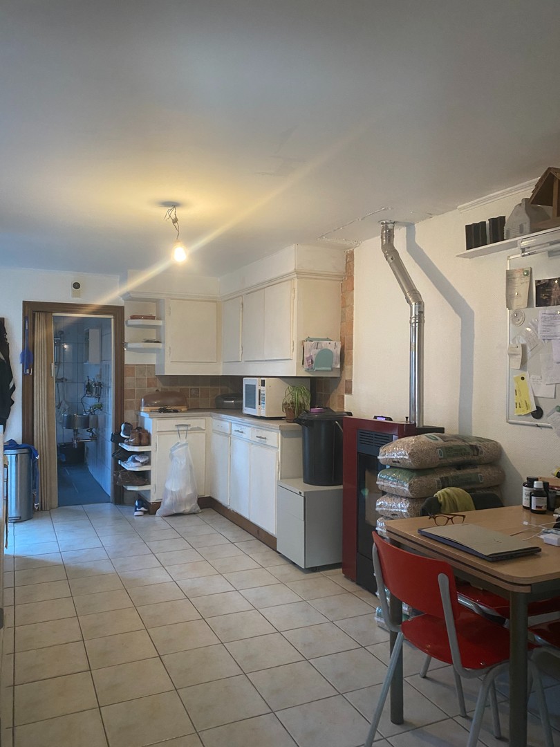 Centraal gelegen te renoveren woning met ruime garage en achterliggende tuin - foto 4