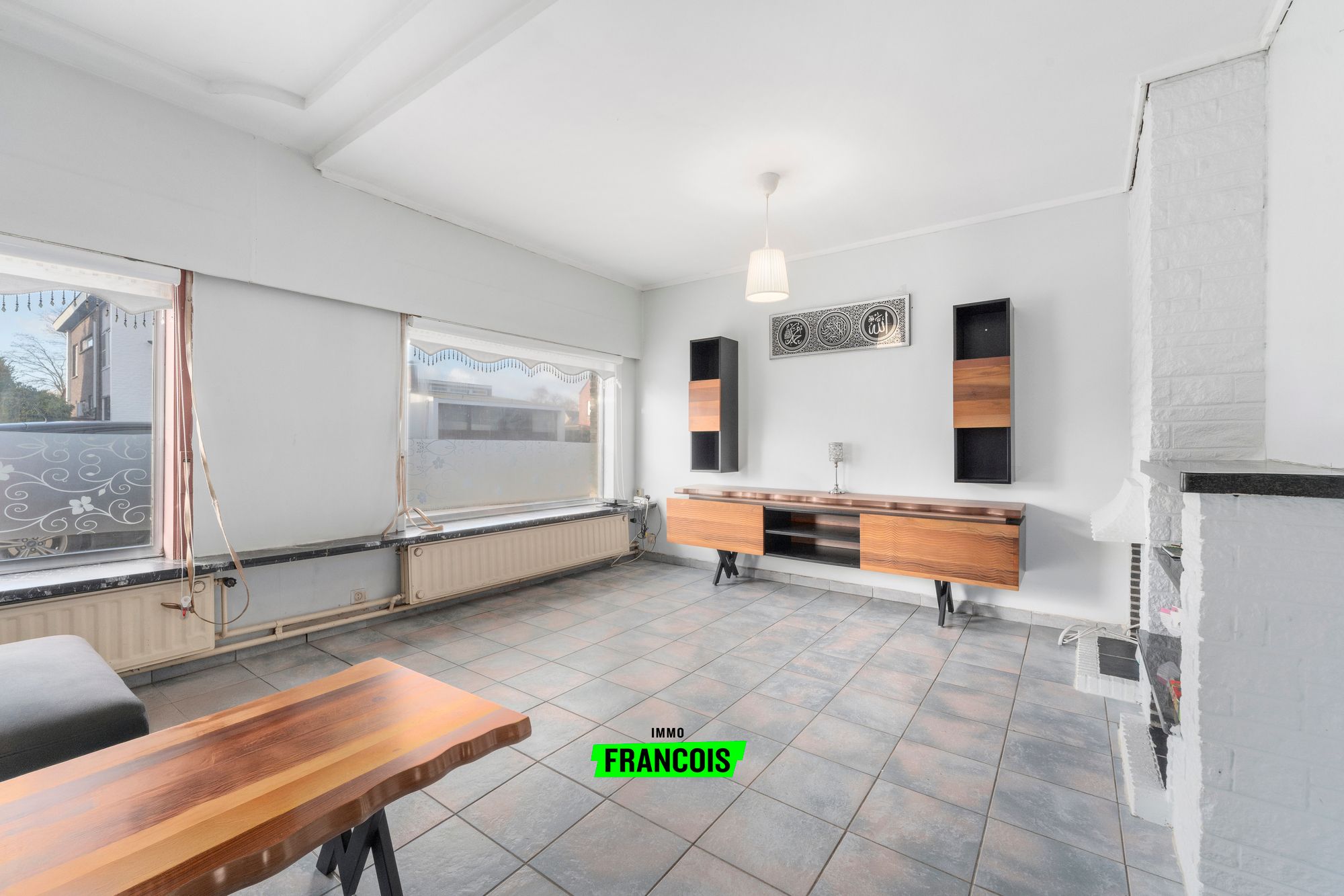 Centraal gelegen woning met renovatiepotentieel te koop in Assenede. - foto 3