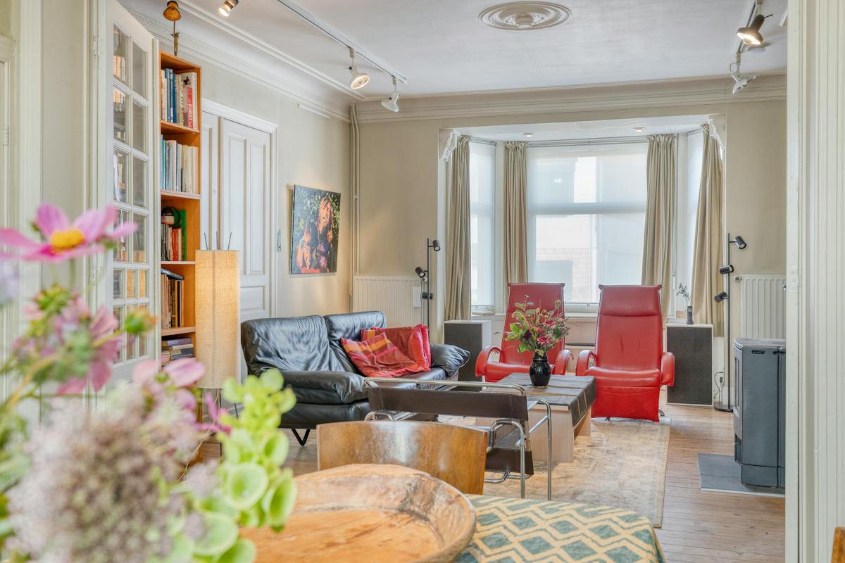 Karaktervolle woning met 7 slaapkamers, authentieke elementen en een ruime tuin - foto 4