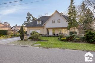 Uitermate degelijk gebouwde en perfect onderhouden villa, gelegen in een rustige en groene omgeving op korte afstand van het centrum van Achel...