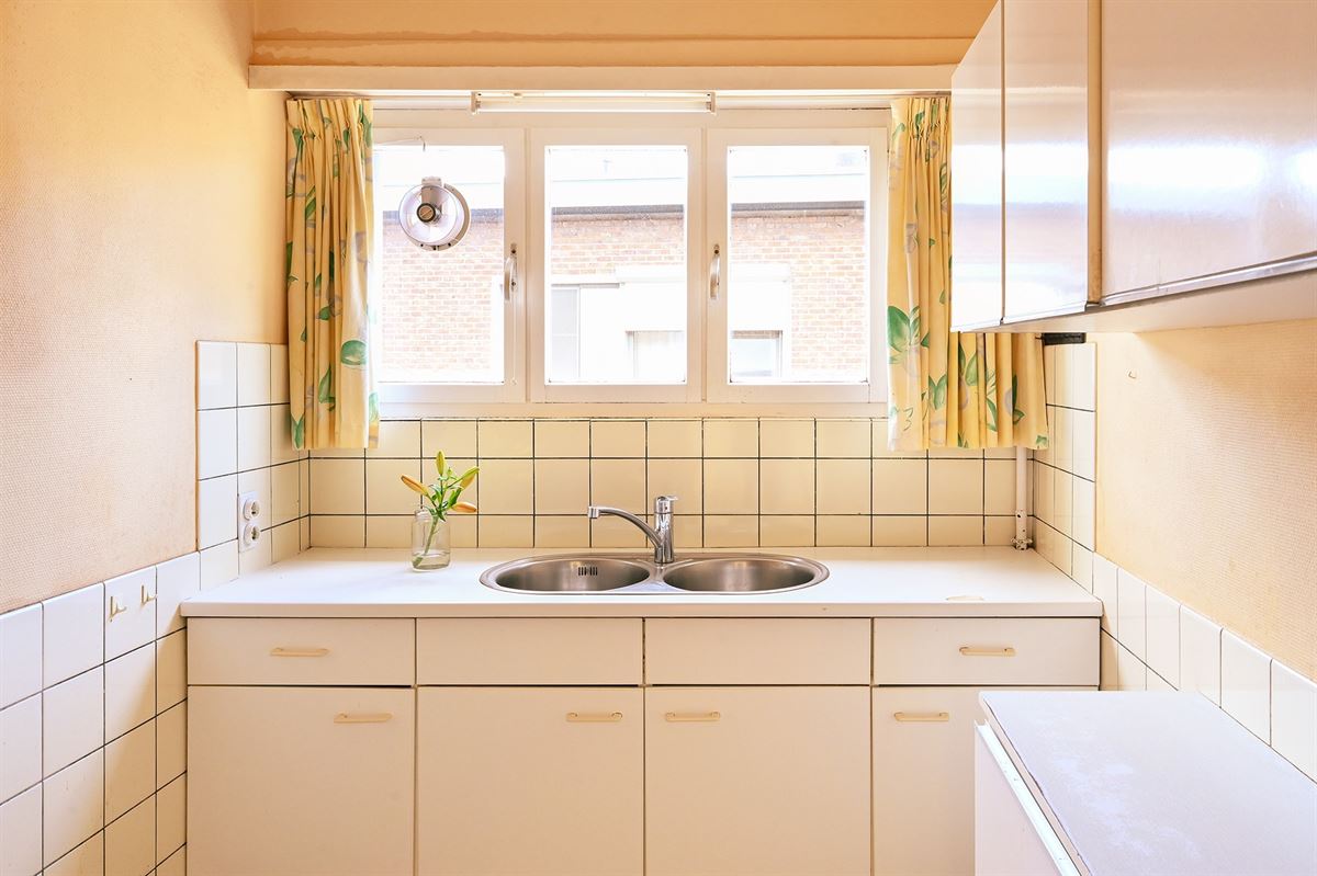 Lichtrijk te renoveren hoekappartement in hartje Brasschaat - foto 5