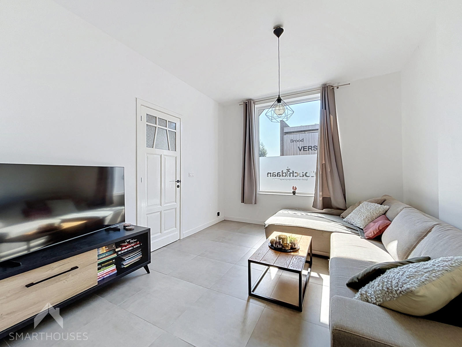 Volledig gerenoveerde woning met 3 slaapkamers en leuke tuin - foto 4