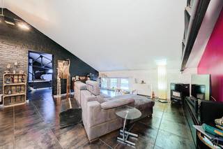 We Invest Liège et Julie ont le plaisir de vous présenter à la vente ce loft de 150m².Découvrez ce magnifique loft de style industriel, idéalement...