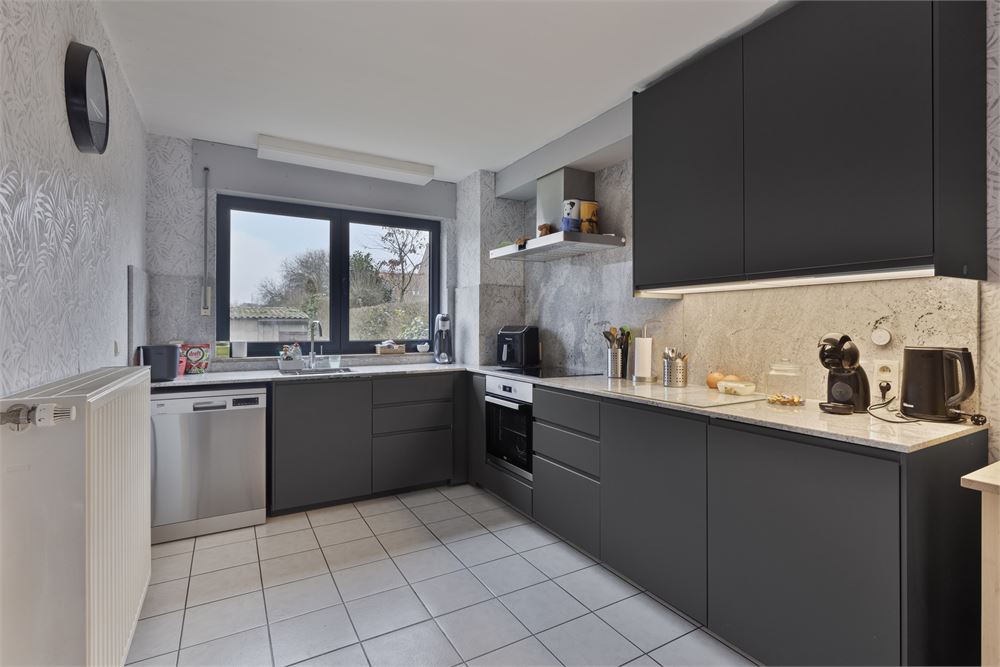 Gezinswoning met 4 slaapkamers en zongeoriënteerde tuin in Tongeren-Borgloon - foto 2