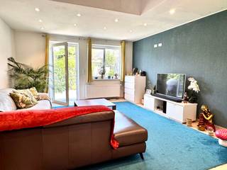 Goedgelegen INSTAPKLARE GEZINSWONING met 3 slaapkamers en tuin, gerenoveerd in 2015. Indeling: ruime eetkamer met volledig geïnstalleerde...