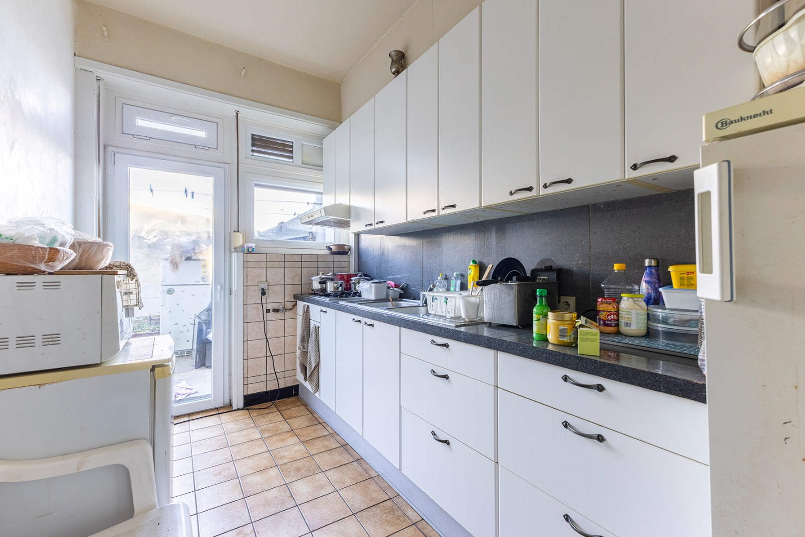 Gelijkvloers appartement met koer! - foto 5