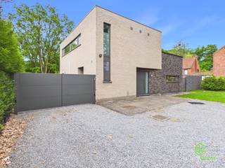 + If you click through to this property on our own website (www.empresaconsult.be), you will find a full 360° impression! +On the transit road between Hasselt and Bokrijk we find this recent family home on a south facing plot of 7a 68ca.Thanks to its central location, all amenities are easily accessible. In the immediate vicinity there is a kindergarten and elementary school, but also the colleges and universities in Diepenbeek are less than 4km away.The train station is less than 2km away and offers a smooth connection towards Leuven and Brussels. The city centers of Hasselt and Genk can be reached in less than 10 minutes by car.The house was built in 2010 which results in a nice EPC label B. With the addition of 14 solar panels the EPC score drops and an A label can be obtained.Recently air conditioners were installed in the living room and the night hall.The house has a partial cellar which provides additional storage space.On the ground floor, the house is entered through the entrance hall from where the guest toilet, the living room, the laundry room and the first bedroom/office are accessible. The beautiful glass door opens into the open living space where there is a cozy sitting area and a beautiful open kitchen. Thanks to the large windows there is a pleasant light and connection to the garden. The kitchen is hyper-equipped and features both a gas stove and an induction stove.The convenient adjacent laundry room offers additional storage and stairs to the basement. The laundry room is also accessible through an exterior door, extra convenient in conjunction with the shower room.Upstairs, three spacious bedrooms and the bathroom can be found. This bathroom was equipped with a bathtub, a convenient walk-in shower, a toilet and a cabinet with double sink. The roof terrace can be reached through the door in the night hall.Outside we find an enclosed garden equipped with an electric gate, a pleasant terrace and a large garage. The southern orientation allows to enjoy the sun at all times of the day.Thanks to the shower room and the bedroom on the ground floor, the house is also very suitable as a multi-generational house.