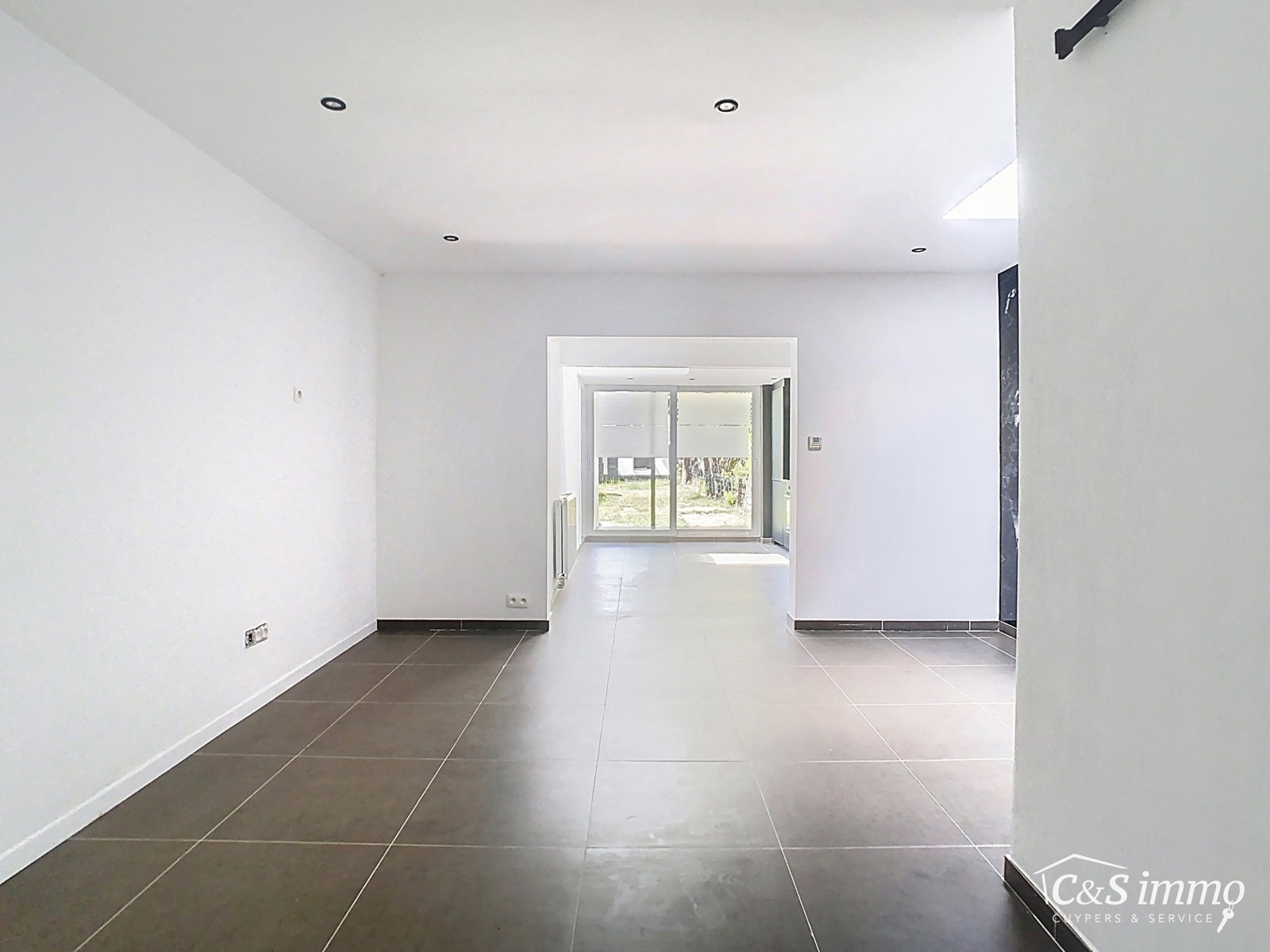 Instapklare woning met ruime tuin en hobbyruimte - foto 4