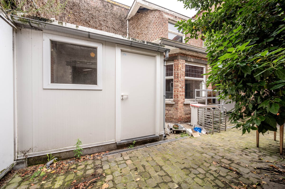 Te renoveren huis met handelspand te koop in Kuurne - foto 5