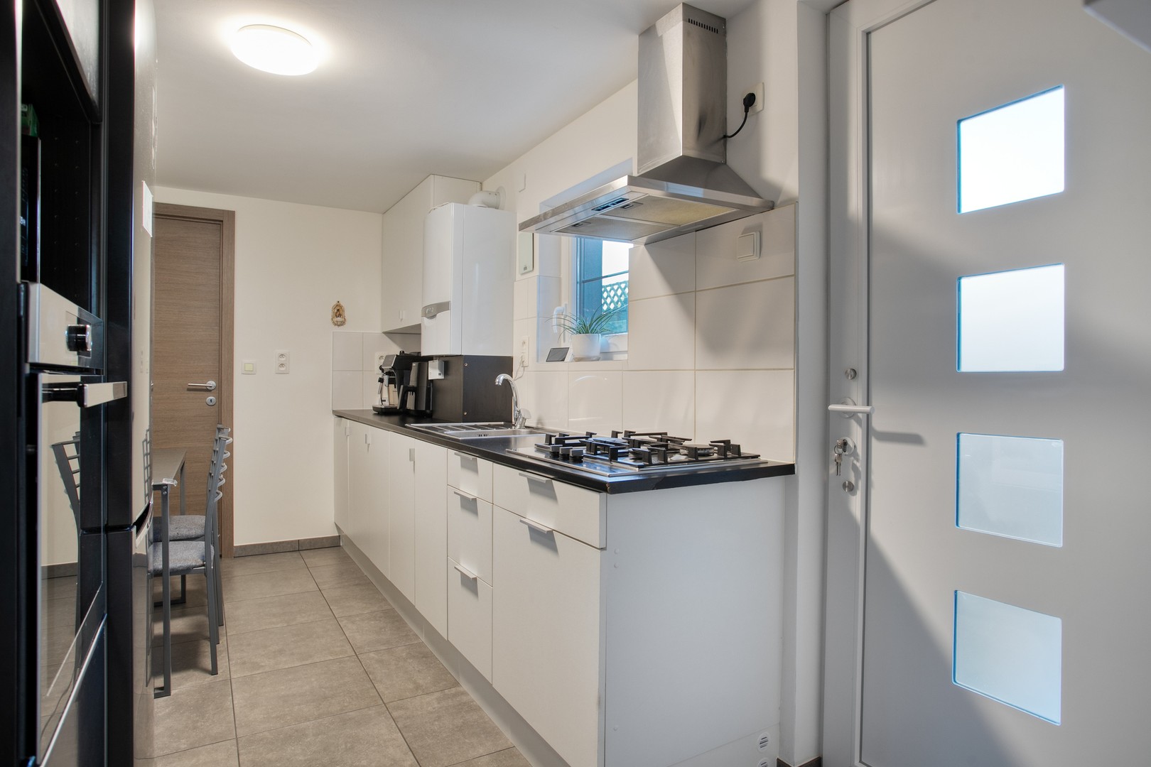 Instapklare tussenwoning met 2 slaapkamers en zeer centrale ligging in Roeselare - foto 5