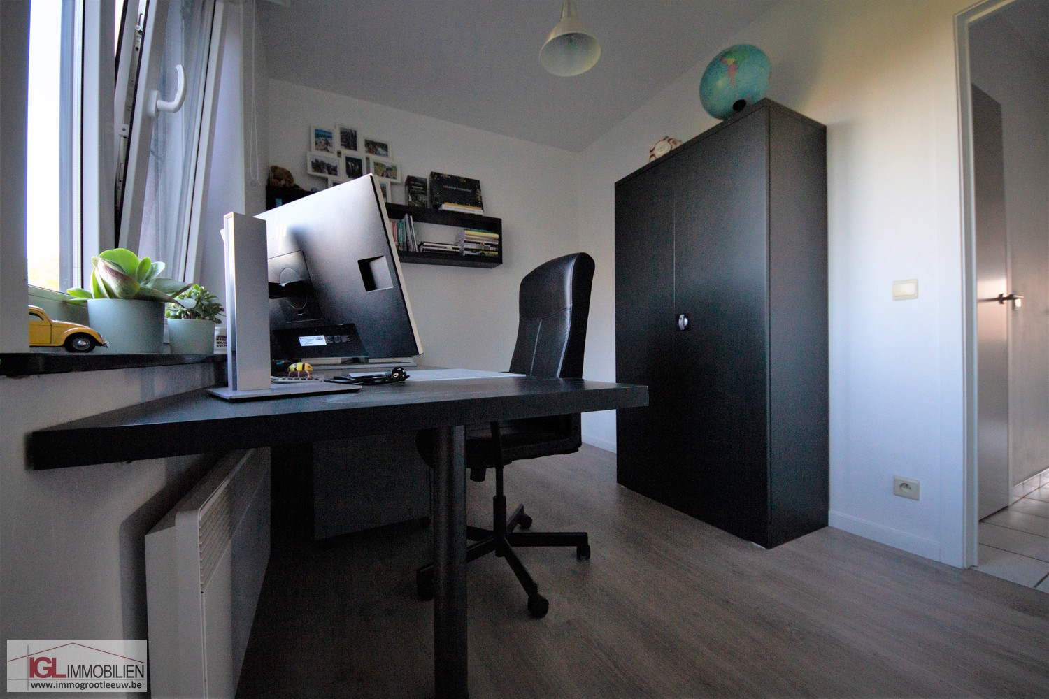 Appartement spacieux au rez-de-chaussée avec 2 chambres à coucher et garage fermé - photo 5