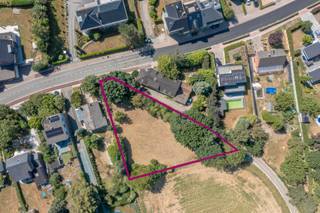 <p>Exclusive building plot of 12a 72ca with green views, Dilbeek.</p><p>Located at one of the highest points in the area, on the corner of Brusselstraat and Draaiberg/Kortemansstraat, this plot offers a magnificent view over a green agricultural zone. A discreet location that remains easily accessible via the E40 and R0, with shops nearby.</p><p></p><p>The plot is buildable within a zone of 17m wide by 18m deep, with a maximum floor area of 250m², in accordance with the subdivision regulations. Ideal for the construction of a spacious and comfortable detached villa.</p><p></p><p>In 2024, a building permit was already granted for a detached family home with ground floor and first floor under a flat roof structure. </p><p></p><p>Renderings are available for information purposes.</p><p></p><p>The full subdivision regulations are available on request via rune.stallaert@living-stone.be</p>