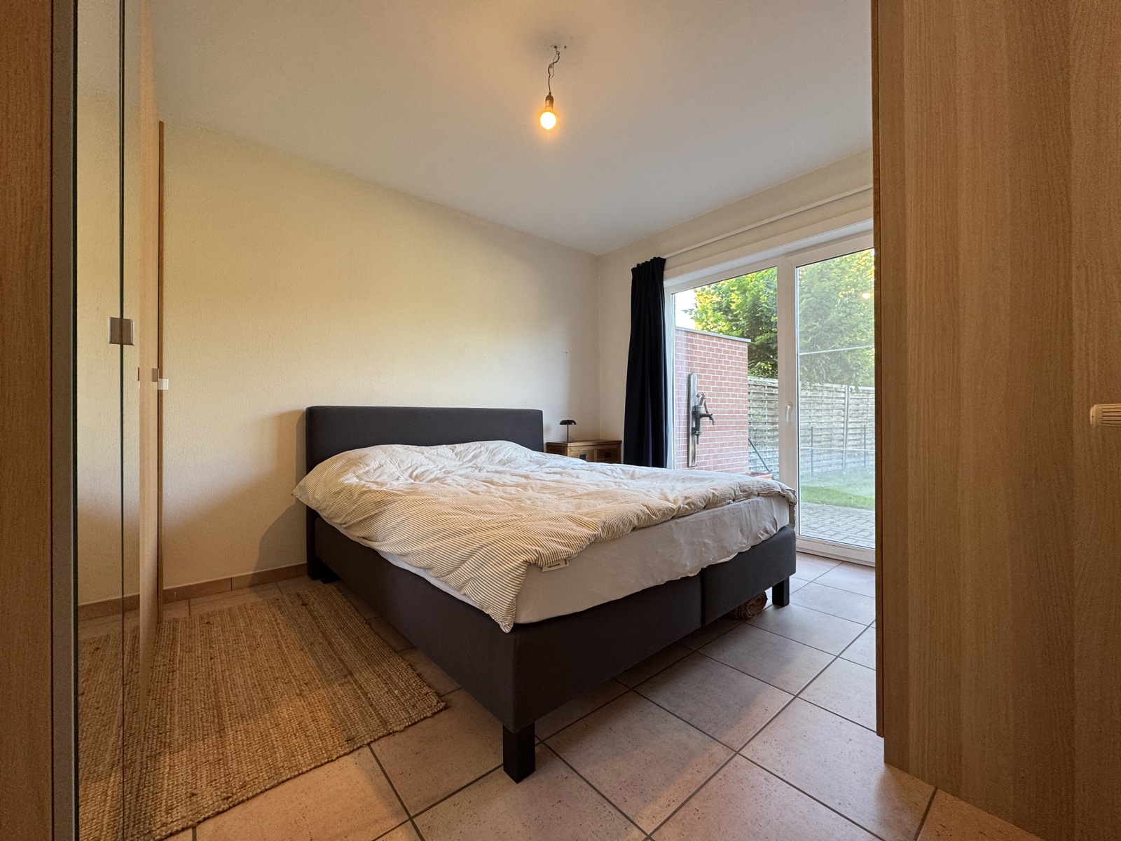 Gelijkvloers appartement met ruime privé tuin en garage - foto 4