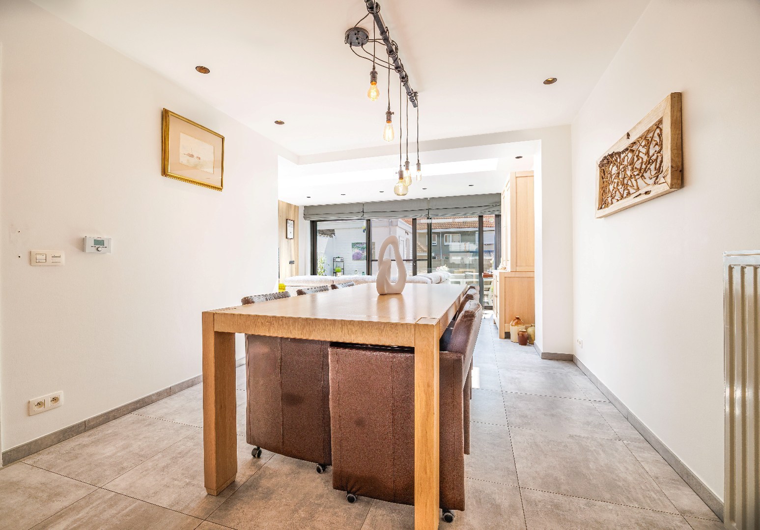 Top gerenoveerde woning met uitzonderlijke lichtinval in het hartje van Heist - foto 4