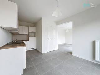 Tel: 0456 12 69 37 / E-mail: kilian.f@weinvest.be<br /><br />We Invest biedt exclusief een prachtig appartement aan, gelegen in een zone met beperkte autotoegang, tussen de site van Tour & Taxis, groene ruimtes en het Kanaal.<br /><br />Gelegen op de 4e verdieping met lift van het Liberty-gebouw, bestaat het appartement uit: een inkomhal, een woonkamer met open volledig uitgeruste keuken, een wasruimte, een apart toilet, één slaapkamer met een douchekamer en een terras.<br /><br />Technische informatie: dubbele beglazing, ventilatiesysteem met dubbele flux, Proximus-glasvezel geïnstalleerd, thermische en akoestische isolatie.<br /><br />Vlotte toegang tot de Europese wijk en tot de NAVO. Openbaar vervoer in de buurt (treinen, trams, metro en bussen).<br /><br />Optionele parkeerplaats beschikbaar voor €135/maand extra.<br /><br />Huur: €1.150<br />Kosten: €170 (onderhoud van de gemeenschappelijke delen en privatieve verwarming)<br /><br />EPC: A<br /><br />Beschikbaar vanaf 01/07/2026! Huurovereenkomst van 3 jaar!<br /><br />Aarzel niet om een bezoek te plannen! Ontdek andere exclusieve panden op www.weinvest.be.