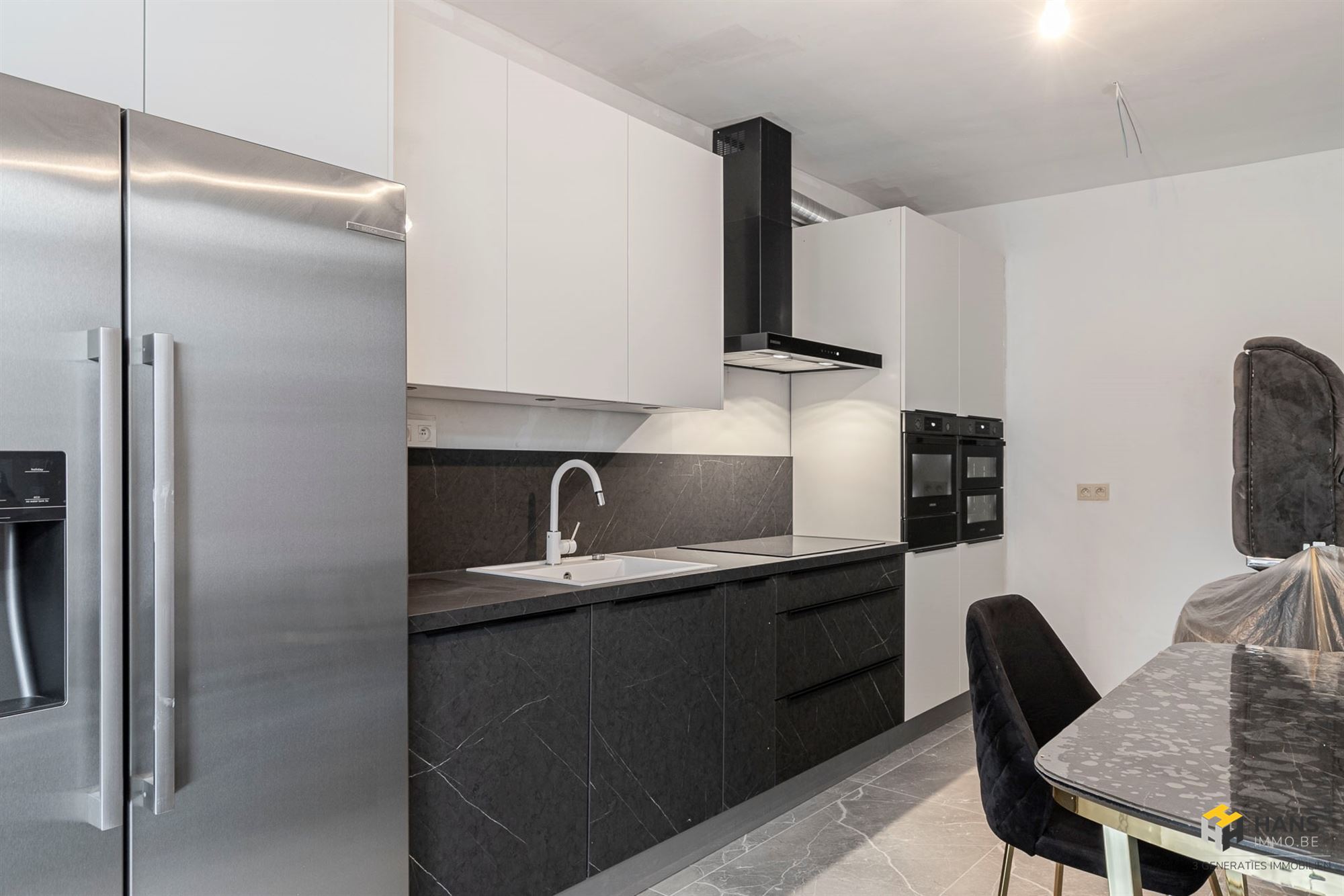 Gerenoveerd woonhuis (248 m²) met garage en magazijn in Bornem - foto 4