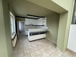 Duplex apartment : stairs to first floor - entrance - living room - dining area - equipped kitchen - spacious terrace - 2 bedrooms - bathroom...