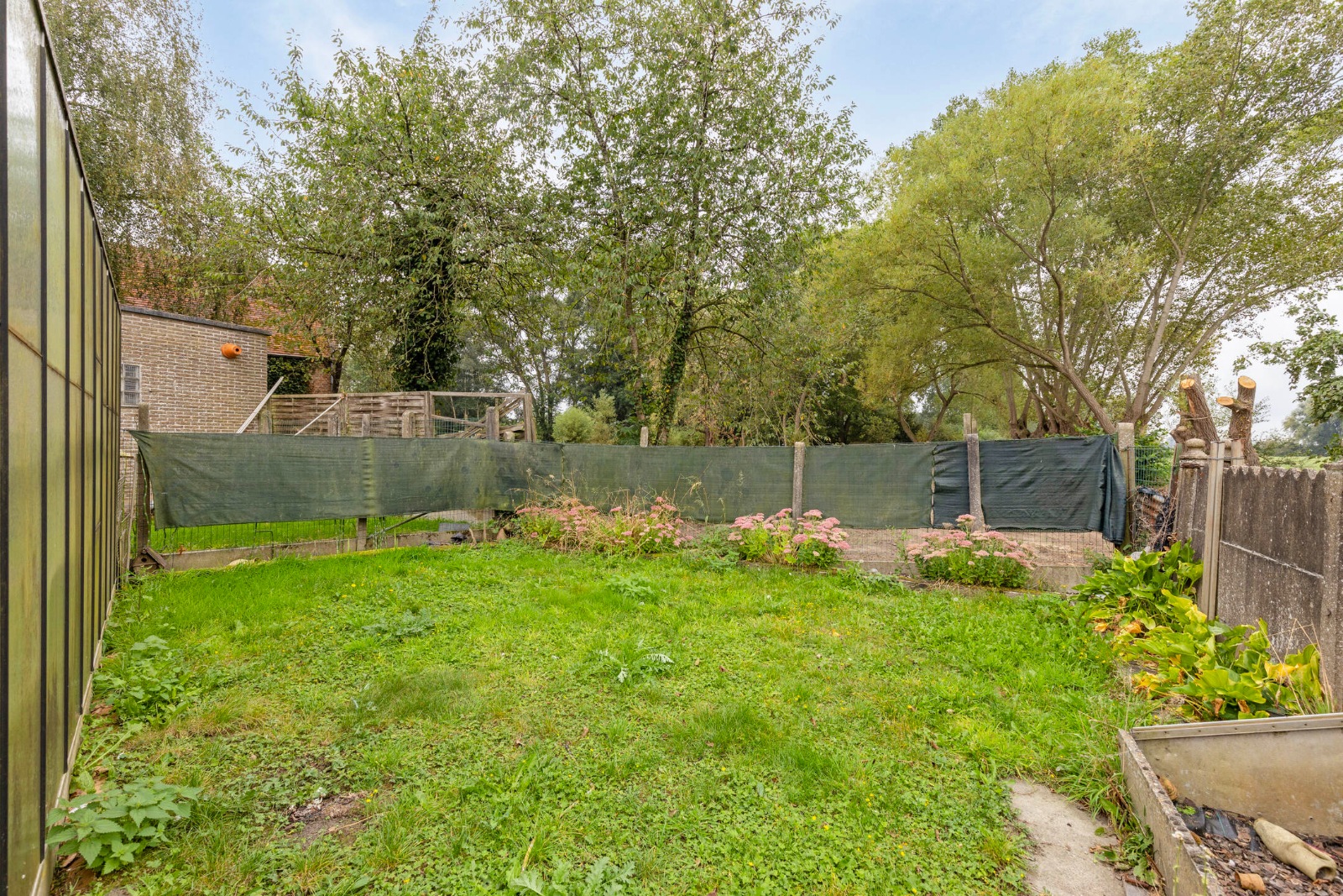 Gelijkvloerse woning met 3 slpk, garage en tuin - foto 3