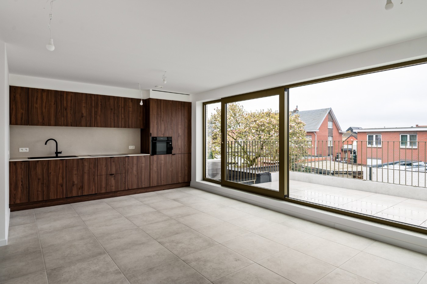 Ruim en licht nieuwbouw app. met 2 slpk., terras en garagebox - foto 1