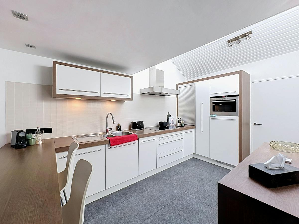 Lichtrijk triplex-appartement met 1 slaapkamer te huur in Antwerpen - foto 5