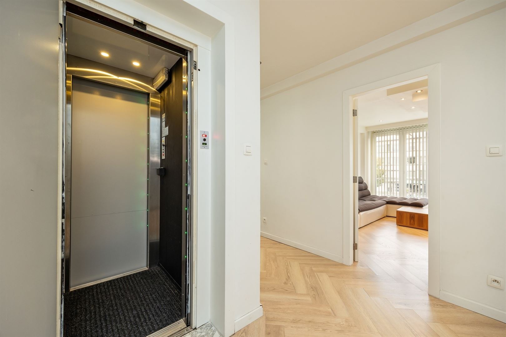 Ruim opbrengsteigendom met lift, garage en verhuurde handelsruimte - foto 5