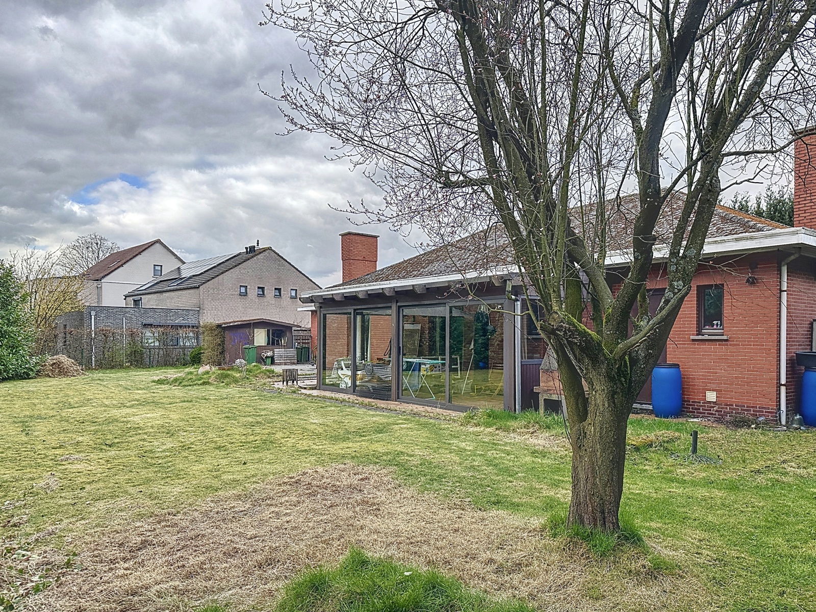 Projectgrond met af te breken woning - foto 1